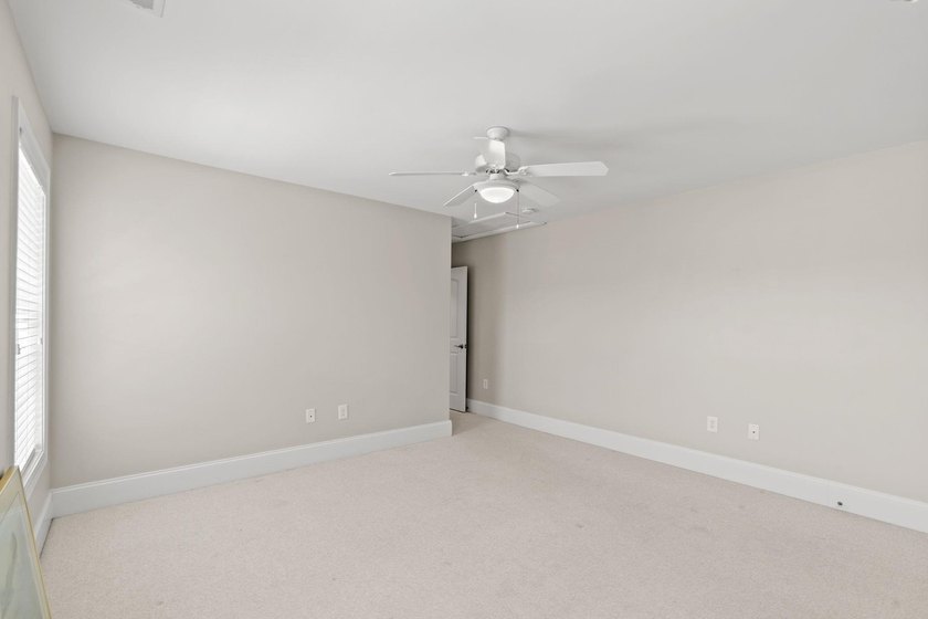 Nestled in a beautiful lakefront setting, this all-brick - photo 41