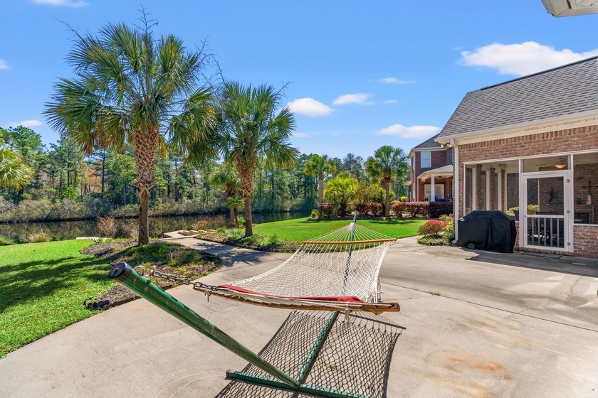 Nestled in a beautiful lakefront setting, this all-brick - photo 46