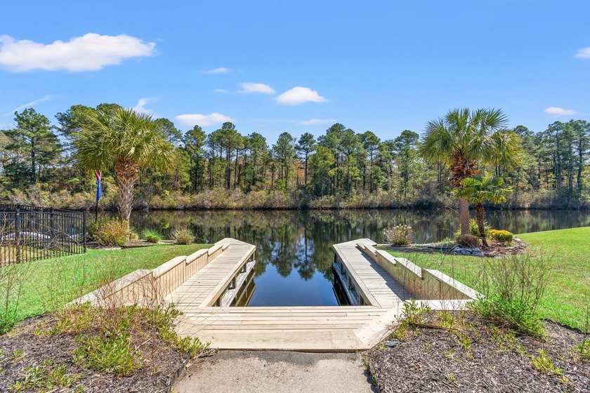 Nestled in a beautiful lakefront setting, this all-brick - photo 48