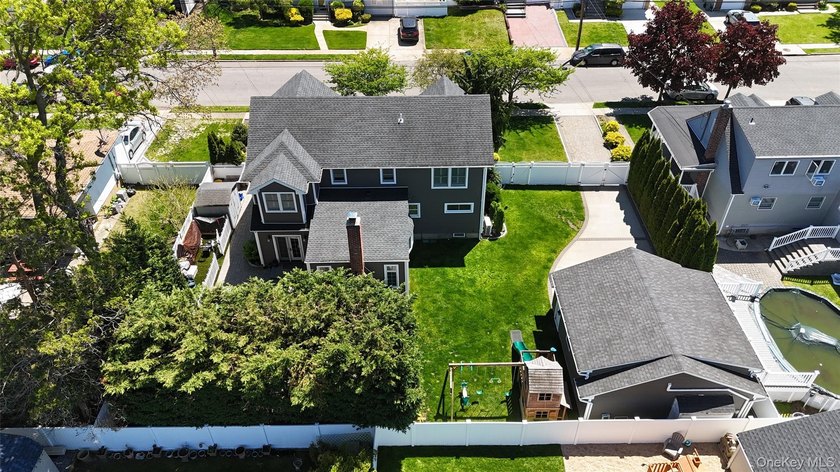 Welcome to this exceptional custom-expanded home in Massapequa - photo 46