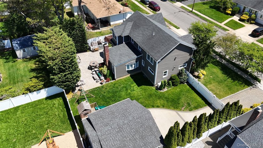 Welcome to this exceptional custom-expanded home in Massapequa - photo 47