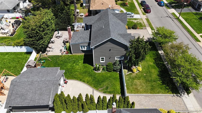 Welcome to this exceptional custom-expanded home in Massapequa - photo 48