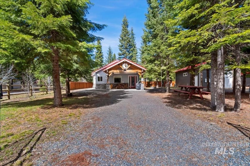 NEW PRICE! Tucked away on a peaceful, fenced .49-acre wooded lot - photo 5