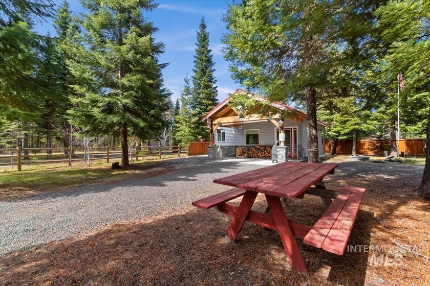 NEW PRICE! Tucked away on a peaceful, fenced .49-acre wooded lot - photo 6