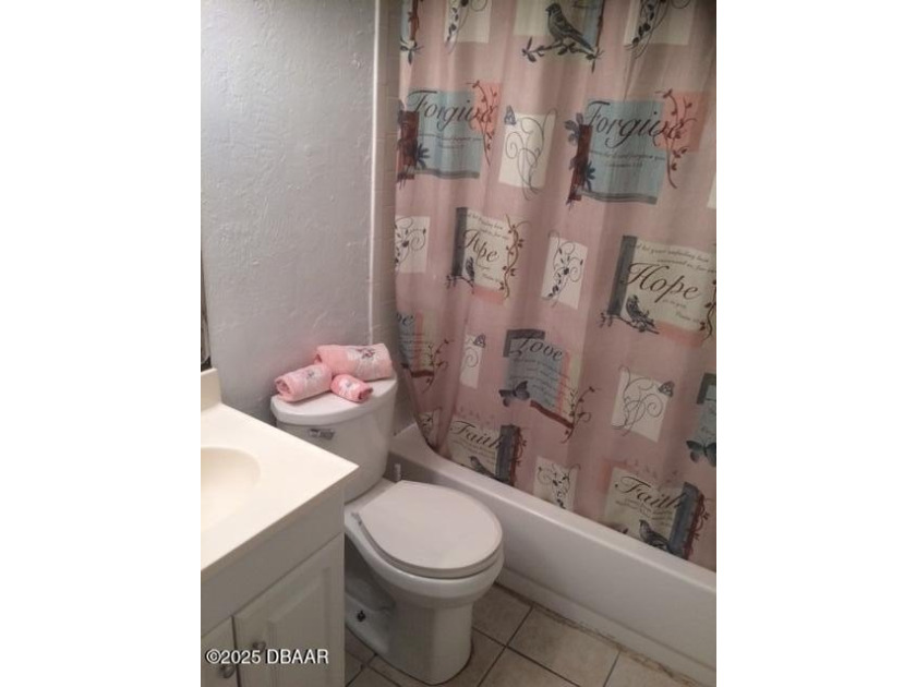 This well-maintained 1,500 sq. ft. concrete block home offers - photo 11