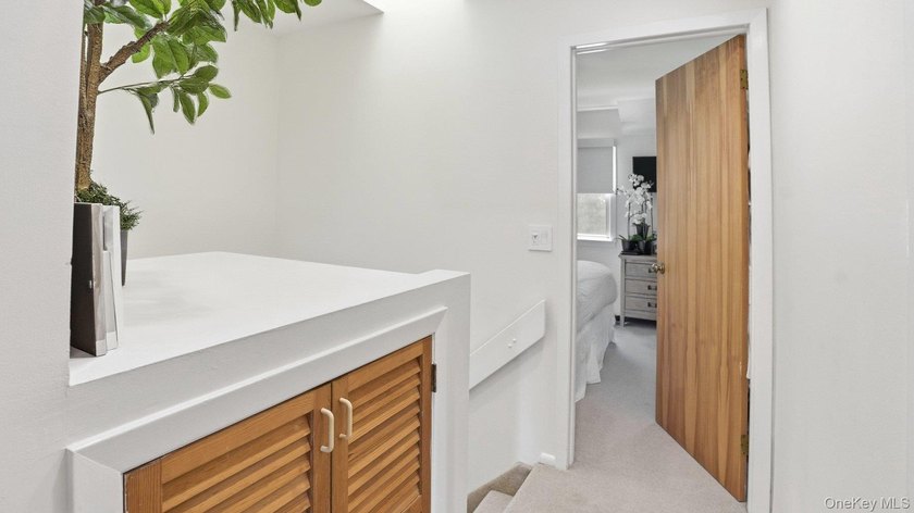 Welcome to 49 Canoe Place Rd, Unit 416, a charming coastal - photo 21
