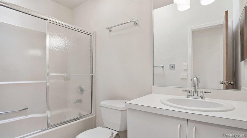 Welcome to 49 Canoe Place Rd, Unit 416, a charming coastal - photo 22