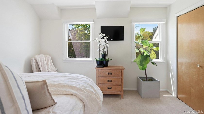 Welcome to 49 Canoe Place Rd, Unit 416, a charming coastal - photo 23