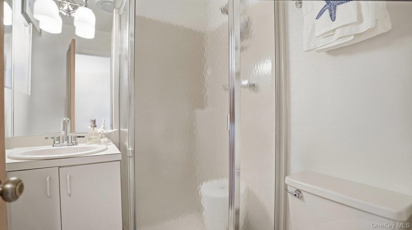 Welcome to 49 Canoe Place Rd, Unit 416, a charming coastal - photo 24