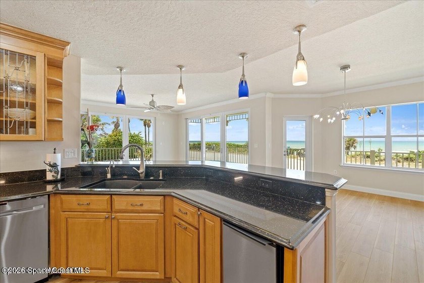 Experience luxury coastal living in this beautiful updated - photo 6