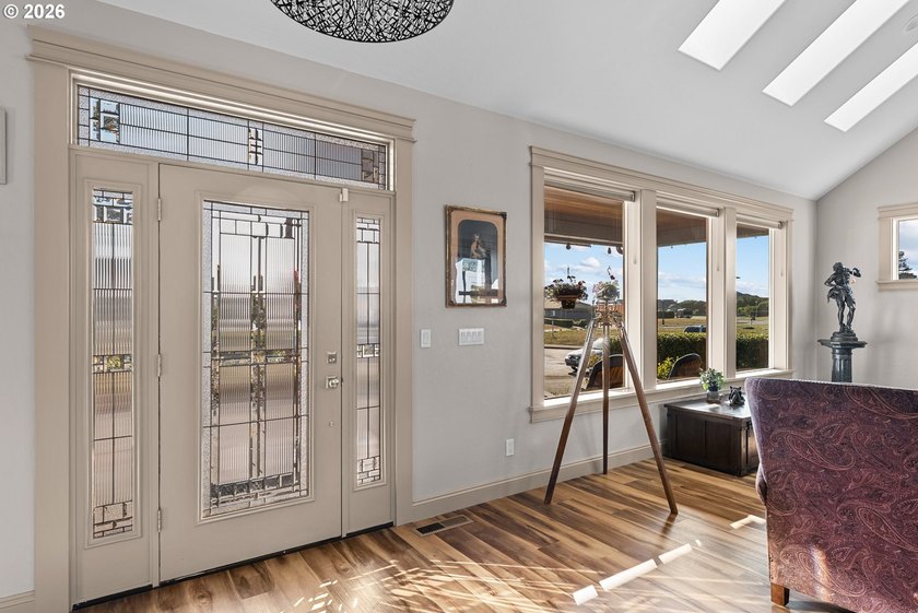 Coastal luxury meets comfort in this custom home within a - photo 3