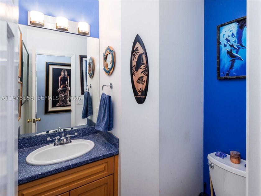 A rare waterfront estate along a 200-foot wide canal with a - photo 26