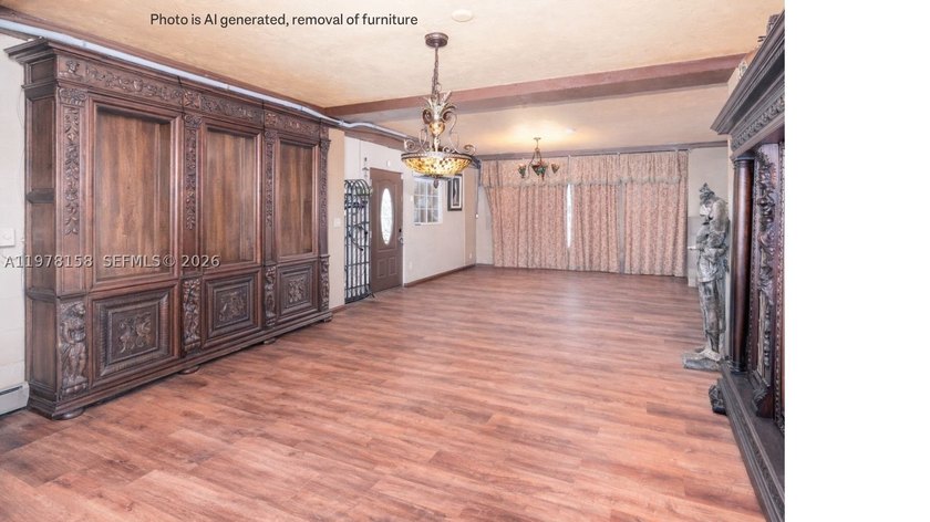 A rare waterfront estate along a 200-foot wide canal with a - photo 33