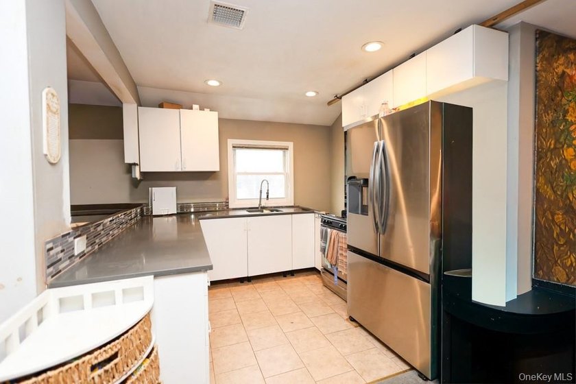 This larger-than-average corner residence offers outstanding - photo 13