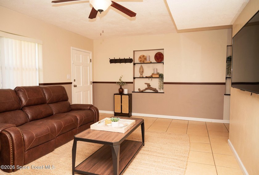 Freshly painted and move-in ready, this charming home at has - photo 3