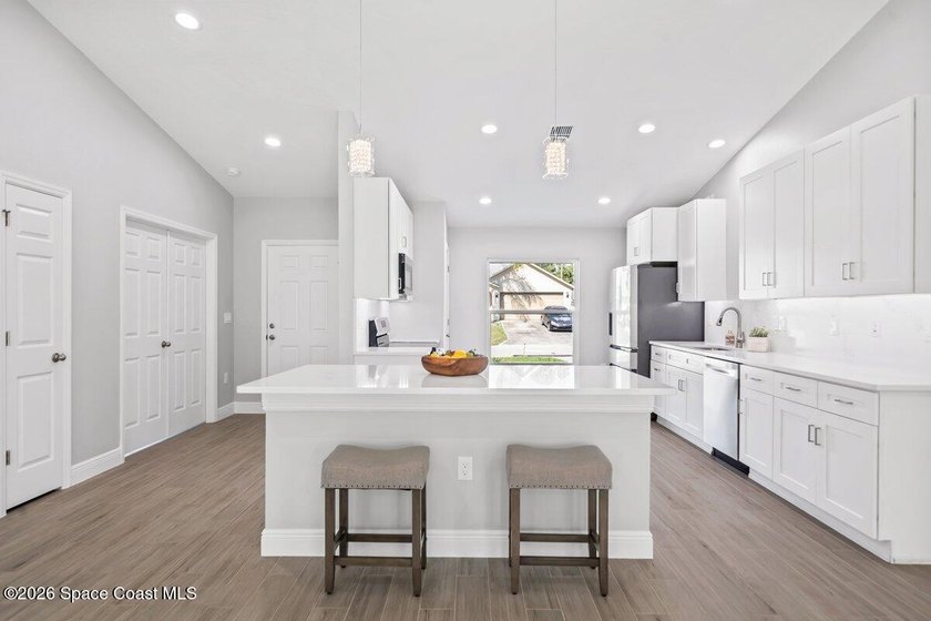 Move-in ready with over *$40,000 in luxury upgrades**, this - photo 6