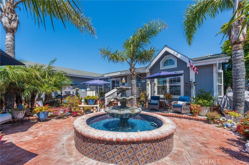 Experience effortless coastal living in this beautifully - photo 2