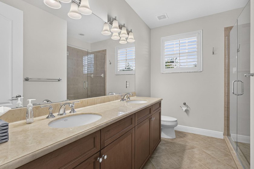 Nestled in the highly desirable Jupiter Country Club, this - photo 29