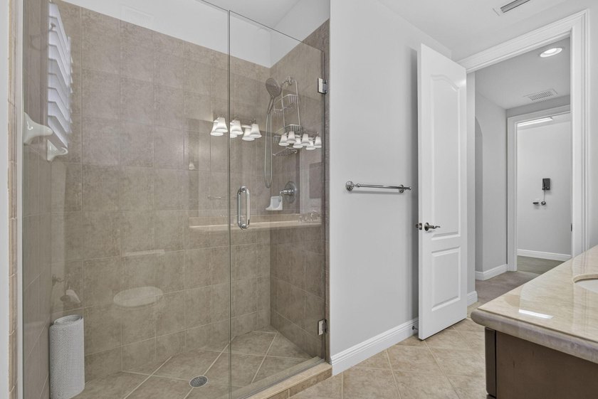 Nestled in the highly desirable Jupiter Country Club, this - photo 30