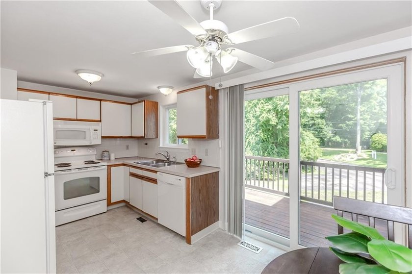 Step into this welcoming townhouse style unit located in - photo 11