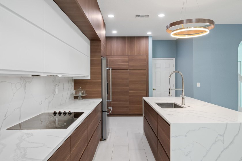 Wow! 180K in upgrades on this beautiful 4-bedroom, 3-bath home - photo 14