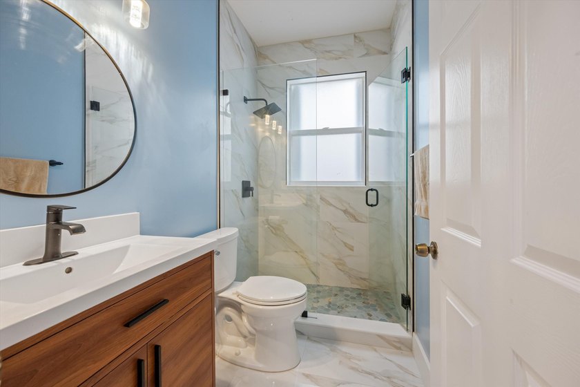 Wow! 180K in upgrades on this beautiful 4-bedroom, 3-bath home - photo 24