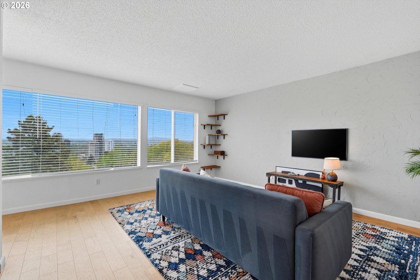 Enjoy elevated Portland living from this light-filled Abitare - photo 10