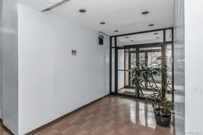 Prime Flushing! Top floor, corner southwest exposure. Spacious 2 - photo 22