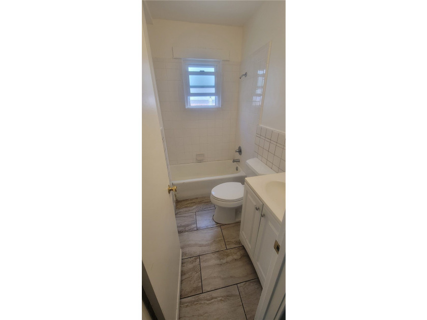 Discover the potential of this Duplex located at 411 E 8th - photo 14