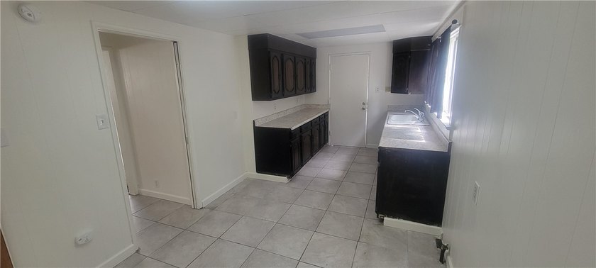 Discover the potential of this Duplex located at 411 E 8th - photo 15