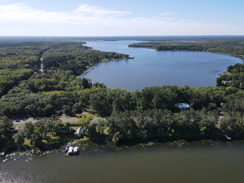 This 1.3-acre wooded lot offers 258 feet of pristine lakeshore - photo 10