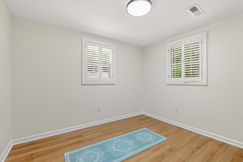 Escape to lake life in this beautifully updated one-story - photo 25