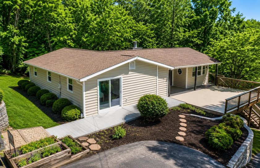 Escape to lake life in this beautifully updated one-story - photo 34