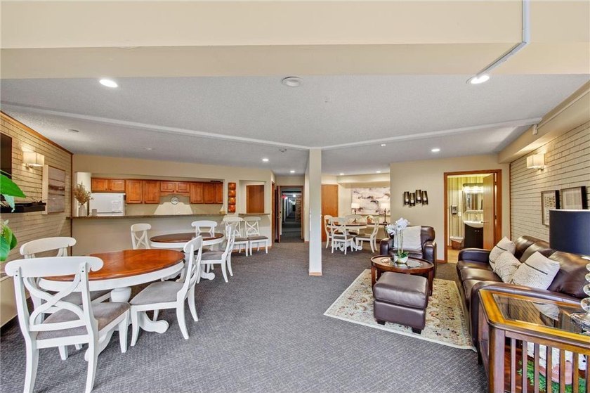 Move right into this top-floor, one-level home offering - photo 16