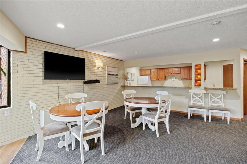Move right into this top-floor, one-level home offering - photo 17