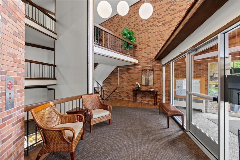 Move right into this top-floor, one-level home offering - photo 18