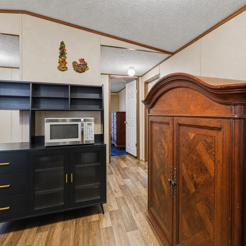 Affordable coastal living awaits in Baywood Estates! Located in - photo 12