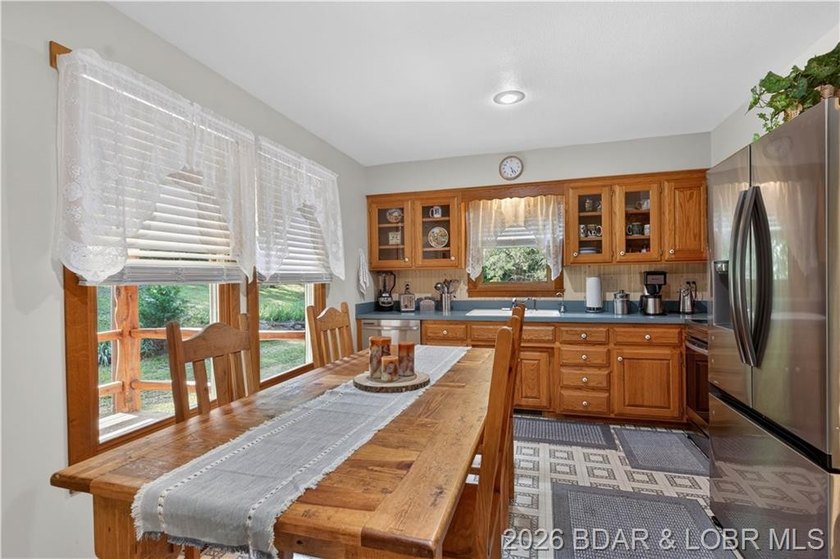 Escape to the tranquility of Truman Lake with this charming - photo 11