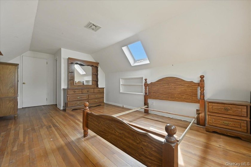 Spacious split-level home set on a huge, private wooded property - photo 21