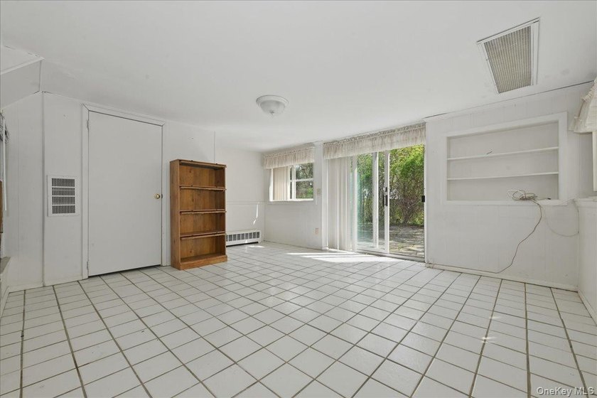 Spacious split-level home set on a huge, private wooded property - photo 23