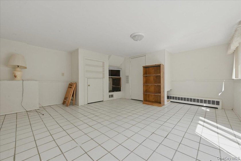 Spacious split-level home set on a huge, private wooded property - photo 24