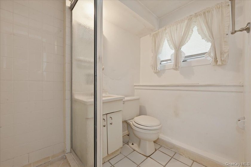 Spacious split-level home set on a huge, private wooded property - photo 25