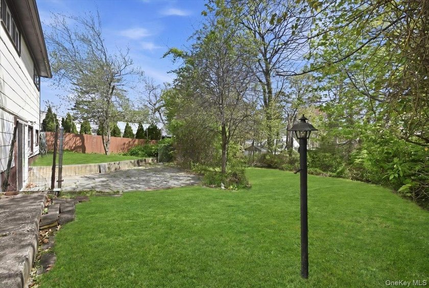 Spacious split-level home set on a huge, private wooded property - photo 26