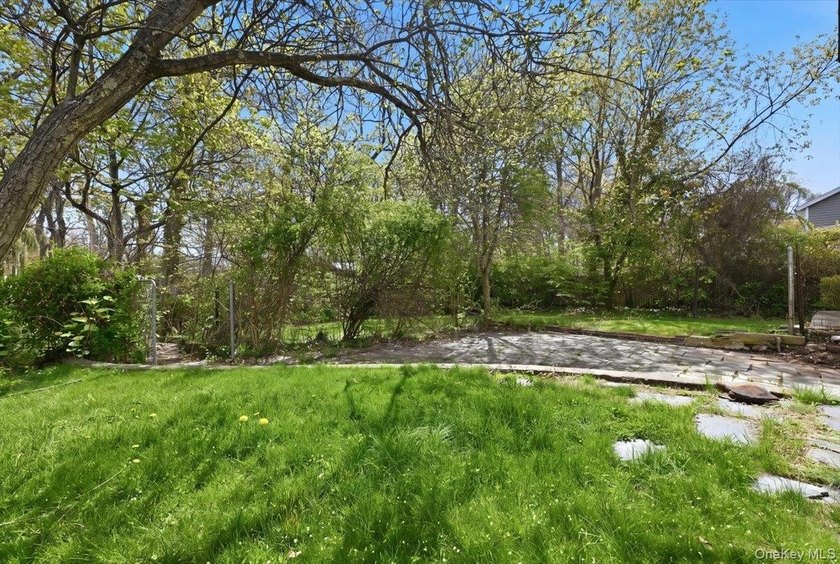 Spacious split-level home set on a huge, private wooded property - photo 27