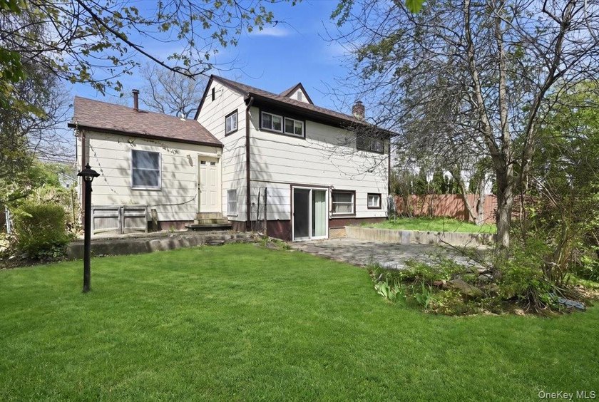 Spacious split-level home set on a huge, private wooded property - photo 28