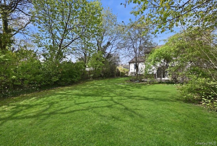 Spacious split-level home set on a huge, private wooded property - photo 31