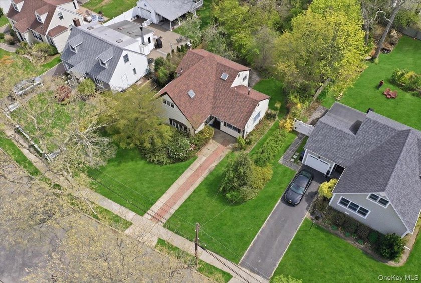 Spacious split-level home set on a huge, private wooded property - photo 32