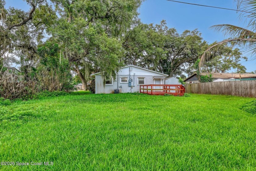 PRICED TO SELL! Cottage charm meets coastal opportunity! Tucked - photo 6