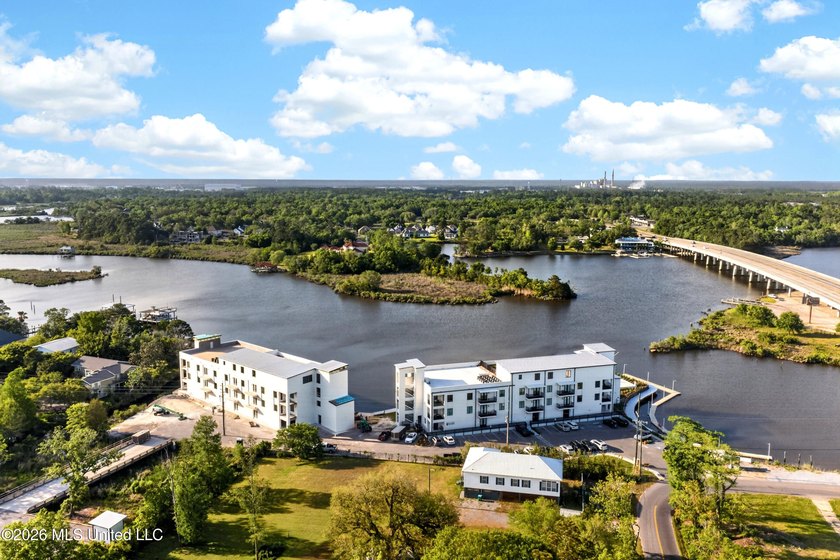 Two bedrooms. Two baths. Direct waterfront. Private balcony over - photo 21