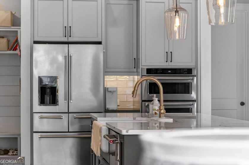 Lake views, low traffic, and luxury finishes in the heart of - photo 6